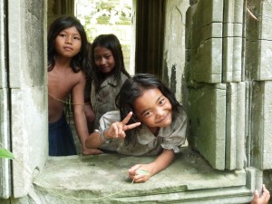 These girls eagerly greet tourists in a temple outside of Siem Reap. 